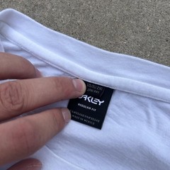 Boxy Oakley white spellout t-shirt with red text logo