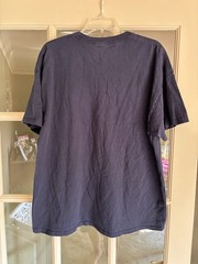 United States Navy T and ironically the color is navy with white lettering. XXL
